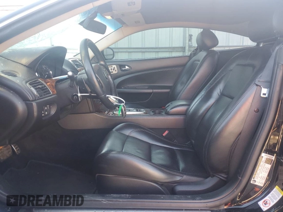2007 Jaguar XK with VIN SAJWA43C779B19601, listed as a Copart auction lot 80102504 with 78,313 mi miles and Salvage Title. Bid and sale history available at carsss.com. Image 7.