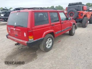 1999 Jeep Cherokee Sport z VIN 1J4FT68S9XL667355, wystawiony jako IAAI lot #42204435 z przebiegiem 217 178 mil mil oraz . Historia ofert i sprzedaży dostępna na DreamBid. Obrazek 4.