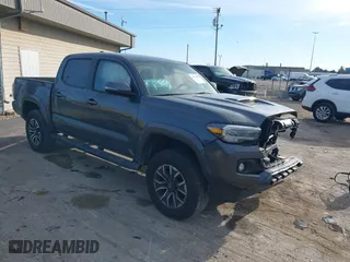 2023 Toyota Tacoma 4WD SR with VIN 3TMCZ5AN8PM574766, listed as a IAAI auction lot 40663003 with 43,978 mi miles. Bid and sale history available at carsss.com. Image 1.