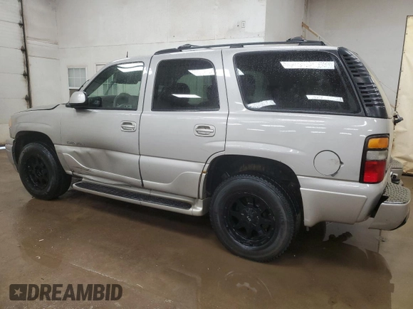 2005 GMC Yukon Denali z VIN 1GKEK63U45J222600, wystawiony jako Copart lot #51329775 z przebiegiem 287 293 mil mil oraz Czysty tytuł • Clean title. Historia ofert i sprzedaży dostępna na DreamBid. Obrazek 2.