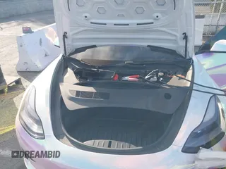 2021 Tesla Model 3 Long Range with VIN 5YJ3E1EB6MF053940, listed as a IAAI auction lot 41344978 with 38,544 mi miles and . Bid and sale history available at DreamBid. Image 10.