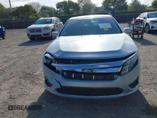 2010 Ford Fusion Hybrid with VIN 3FADP0L35AR354431, listed as a IAAI auction lot 42107722 with 142,250 mi miles. Bid and sale history available at carsss.com. Image 12.
