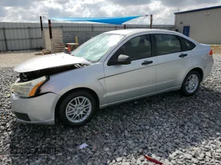 2009 Ford Focus SE with VIN 1FAHP35N09W267059, listed as a Copart auction lot 54155965 with 129,768 mi miles and Salvage Title. Bid and sale history available at carsss.com. Image 1.