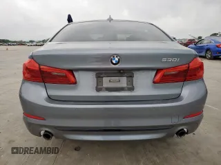 2018 BMW 5 Series 530i z VIN WBAJA5C51JWA37384, wystawiony jako Copart lot #55061215 z przebiegiem 113 809 mil mil oraz Szkody całkowita. Historia ofert i sprzedaży dostępna na DreamBid. Obrazek 6.