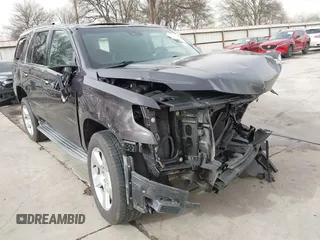 2015 Chevrolet Tahoe LT with VIN 1GNSCBKC5FR504459, listed as a IAAI auction lot 41689405 with 141,783 mi miles and . Bid and sale history available at DreamBid. Image 6.