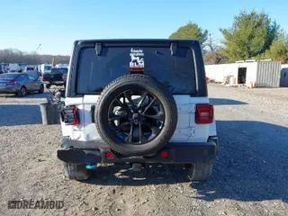 2023 Jeep Wrangler 4xe Sahara with VIN 1C4JJXP61PW684682, listed as a IAAI auction lot 40998281 with 41,138 mi miles. Bid and sale history available at carsss.com. Image 16.