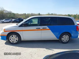 2019 Dodge Grand Caravan SE with VIN 2C4RDGBG8KR646829, listed as a IAAI auction lot 42136947 with 73,015 mi miles and . Bid and sale history available at DreamBid. Image 14.