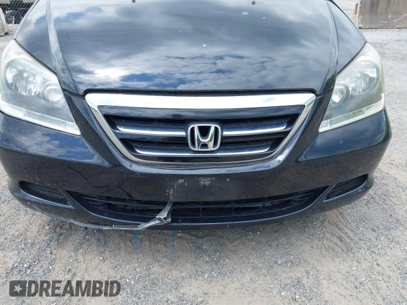 2005 Honda Odyssey EX-L with VIN 5FNRL38775B085512, listed as a IAAI auction lot 42128261 with Not Provided miles and . Bid and sale history available at DreamBid. Image 6.