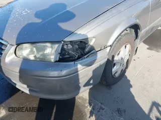 2000 Toyota Camry CE with VIN 4T1BG22K3YU004252, listed as a IAAI auction lot 42130158 with 236,104 mi miles and . Bid and sale history available at carsss.com. Image 6.