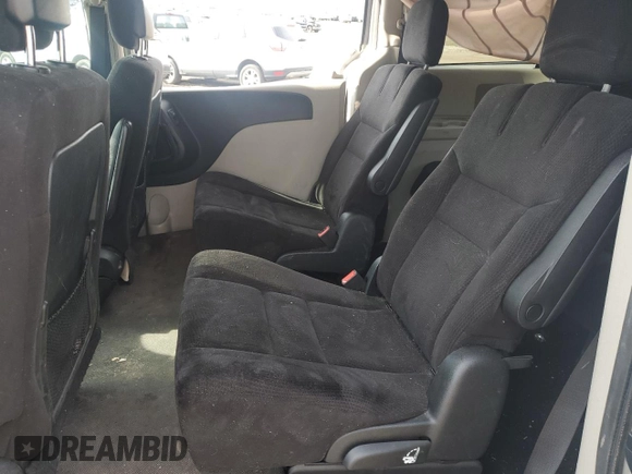 2014 Dodge Grand Caravan American Value with VIN 2C4RDGBG8ER245897, listed as a Copart auction lot 54066945 with 144,177 mi miles and Clean Title. Bid and sale history available at DreamBid. Image 11.
