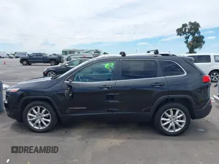 2014 Jeep Cherokee Limited z VIN 1C4PJLDB9EW162416, wystawiony jako IAAI lot #42779797 z przebiegiem 158 581 mil mil oraz . Historia ofert i sprzedaży dostępna na DreamBid. Obrazek 14.