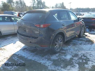 2020 Mazda CX-5 Grand Touring with VIN JM3KFBDM7L1807685, listed as a IAAI auction lot 41392313 with 91,729 mi miles and . Bid and sale history available at carsss.com. Image 4.