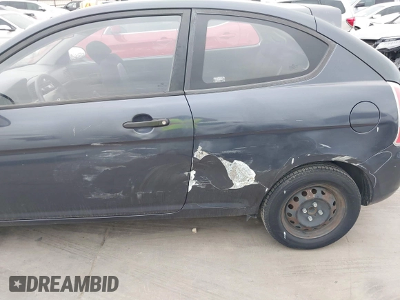 2007 Hyundai Accent GS with VIN KMHCM36C07U003757, listed as a IAAI auction lot 41925544 with 89,882 mi miles. Bid and sale history available at carsss.com. Image 6.