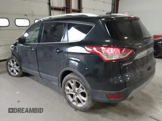 2015 Ford Escape Titanium z VIN 1FMCU0JX9FUB48089, wystawiony jako IAAI lot #41048127 z przebiegiem 133 439 mil mil oraz . Historia ofert i sprzedaży dostępna na DreamBid. Obrazek 3.