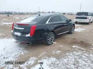 2013 Cadillac XTS Luxury with VIN 2G61R5S30D9100094, listed as a IAAI auction lot 41601711 with 191,068 mi miles and . Bid and sale history available at DreamBid. Image 4.