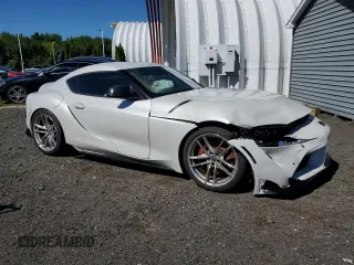 2021 Toyota GR Supra 3.0 with VIN WZ1DB0C0XMW037925, listed as a Copart auction lot 67085904 with 24,458 mi miles and Salvage Title. Bid and sale history available at carsss.com. Image 4.