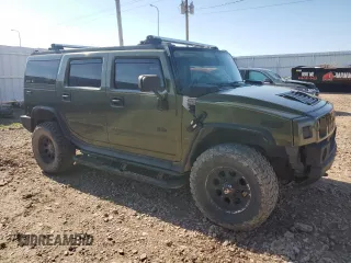 2003 Hummer H2 with VIN 5GRGN23U23H102026, listed as a Copart auction lot 62070254 with 191,588 mi miles and Clean Title. Bid and sale history available at carsss.com. Image 4.
