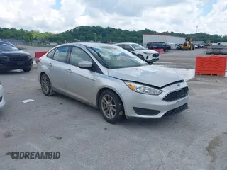 2018 Ford Focus SE with VIN 1FADP3FE2JL301795, listed as a IAAI auction lot 42258758 with 89,633 mi miles and . Bid and sale history available at DreamBid. Image 1.