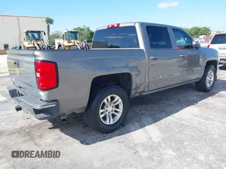 2017 Chevrolet Silverado 1500 LT with VIN 3GCPCREC1HG380406, listed as a IAAI auction lot 42031974 with 128,444 mi miles. Bid and sale history available at carsss.com. Image 4.