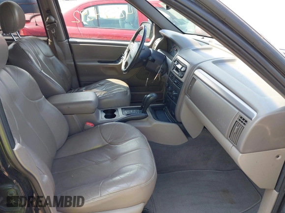 2001 Jeep Grand Cherokee Laredo with VIN 1J4GW48S31C558946, listed as a IAAI auction lot 42384392 with 252,393 mi miles and . Bid and sale history available at DreamBid. Image 5.
