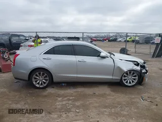 2018 Cadillac ATS RWD z VIN 1G6AA5RX5J0178702, wystawiony jako IAAI lot #41522724 z przebiegiem 79 502 mil mil oraz . Historia ofert i sprzedaży dostępna na DreamBid. Obrazek 13.