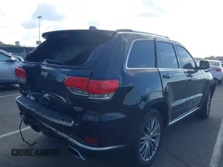 2018 Jeep Grand Cherokee Summit with VIN 1C4RJFJT5JC120523, listed as a IAAI auction lot 42136651 with 75,699 mi miles and . Bid and sale history available at DreamBid. Image 4.