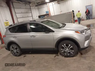 2016 Toyota RAV4 LE with VIN 2T3BFREV8GW509257, listed as a IAAI auction lot 41807349 with 216,031 mi miles. Bid and sale history available at carsss.com. Image 13.