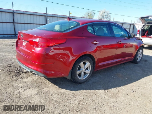 2014 Kia Optima LX with VIN 5XXGM4A72EG272724, listed as a IAAI auction lot 41828285 with 136,996 mi miles. Bid and sale history available at carsss.com. Image 4.