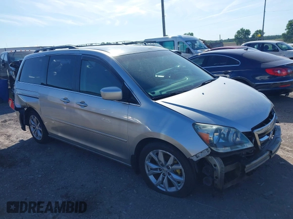 2005 Honda Odyssey EX z VIN 5FNRL38465B411189, wystawiony jako IAAI lot #42310199 z przebiegiem 304 142 mil mil oraz . Historia ofert i sprzedaży dostępna na DreamBid. Obrazek 1.