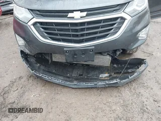 2020 Chevrolet Equinox LT with VIN 2GNAXUEV9L6229579, listed as a IAAI auction lot 41512031 with 96,446 mi miles and . Bid and sale history available at DreamBid. Image 6.
