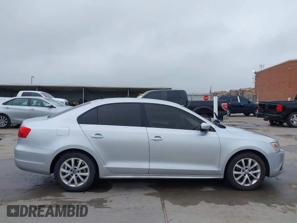 2013 Volkswagen Jetta SE with VIN 3VWDX7AJXDM373706, listed as a IAAI auction lot 42161655 with 202,471 mi miles and . Bid and sale history available at DreamBid. Image 13.