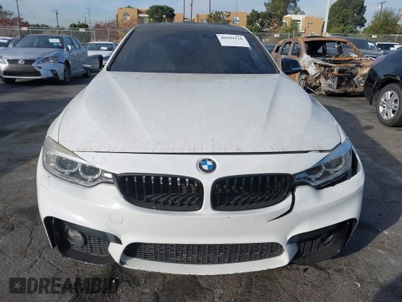 2014 BMW 4 Series 428i with VIN WBA3N3C5XEF710869, listed as a IAAI auction lot 40984116 with 115,958 mi miles and . Bid and sale history available at DreamBid. Image 12.