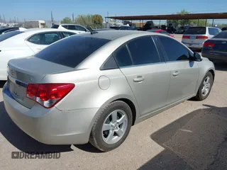 2014 Chevrolet Cruze 1LT with VIN 1G1PC5SB6E7448834, listed as a IAAI auction lot 42582022 with 177,919 mi miles and . Bid and sale history available at DreamBid. Image 4.