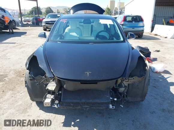 2019 Tesla Model 3 Long Range with VIN 5YJ3E1EB9KF231742, listed as a IAAI auction lot 42114608 with 86,657 mi miles and . Bid and sale history available at DreamBid. Image 13.