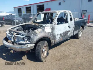 1999 Ford F-150 XL z VIN 1FTRX18L5XNB80564, wystawiony jako IAAI lot #42670775 z przebiegiem Nie podano mil oraz . Historia ofert i sprzedaży dostępna na DreamBid. Obrazek 2.