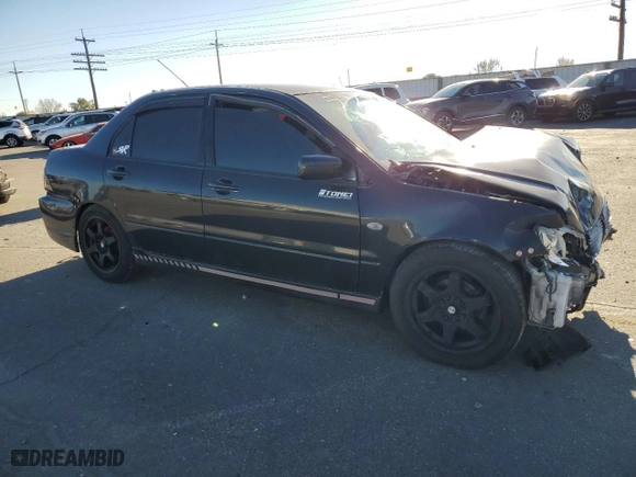 2002 Mitsubishi Lancer OZ-Rally with VIN JA3AJ86E82U024883, listed as a Copart auction lot 79145654 with 170,778 mi miles and Salvage Title. Bid and sale history available at carsss.com. Image 4.