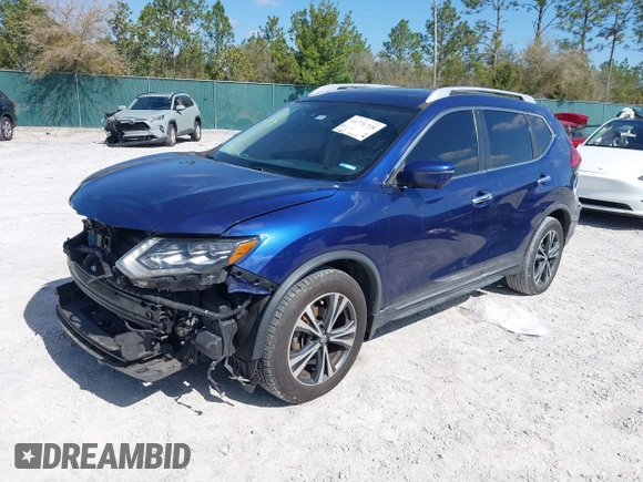 2017 Nissan Rogue SL with VIN JN8AT2MT6HW139347, listed as a IAAI auction lot 41771728 with 215,809 mi miles and . Bid and sale history available at DreamBid. Image 2.