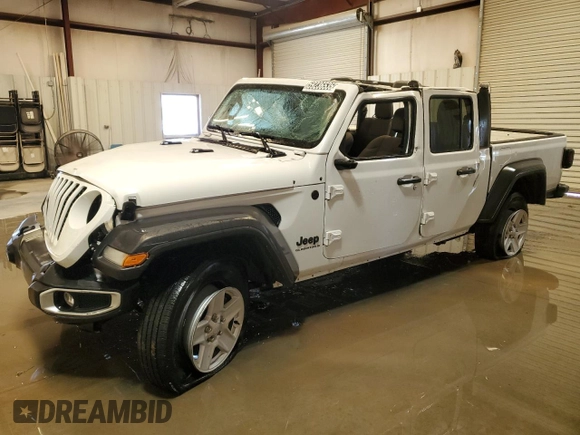 2023 Jeep Gladiator Sport S с VIN 1C6HJTAG0PL523306, выставлен на аукционе Copart как лот 59236535 с пробегом 64 185 миль миль и Списание • Salvage title. История ставок и продаж доступна на DreamBid. Изображение 1.