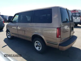 1996 GMC Safari with VIN 1GKDM19W3TB510312, listed as a Copart auction lot 69528134 with 106,226 mi miles and Salvage Title. Bid and sale history available at carsss.com. Image 2.