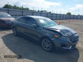 2019 Ford Fusion SEL with VIN 3FA6P0CD7KR159644, listed as a IAAI auction lot 40280287 with 57,329 mi miles. Bid and sale history available at carsss.com. Image 1.