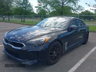 2018 Kia Stinger Premium z VIN KNAE25LAXJ6014856, wystawiony jako IAAI lot #42242842 z przebiegiem 86 091 mil mil oraz . Historia ofert i sprzedaży dostępna na DreamBid. Obrazek 2.