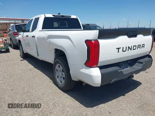 2022 Toyota Tundra with VIN 5TFKB5CDXNX001458, listed as a IAAI auction lot 42640278 with 51,718 mi miles and . Bid and sale history available at DreamBid. Image 3.