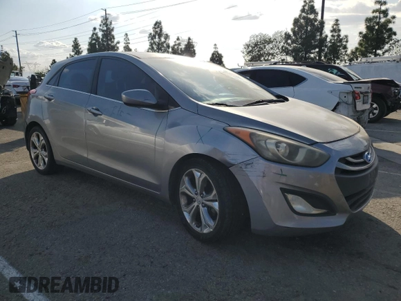 2013 Hyundai Elantra GT with VIN KMHD35LE2DU098164, listed as a Copart auction lot 77272174 with 165,061 mi miles and Salvage Title. Bid and sale history available at carsss.com. Image 4.
