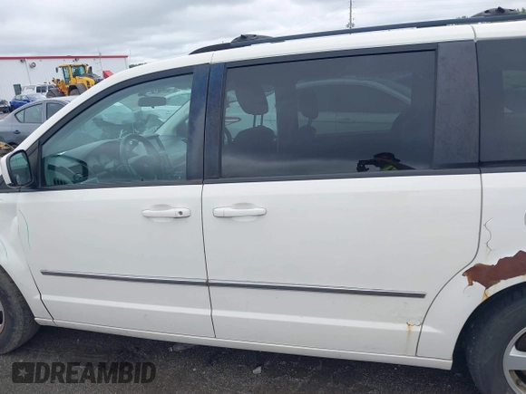 2010 Dodge Grand Caravan SXT z VIN 2D4RN5D18AR247124, wystawiony jako IAAI lot #42257538 z przebiegiem 197 443 mil mil oraz . Historia ofert i sprzedaży dostępna na DreamBid. Obrazek 14.