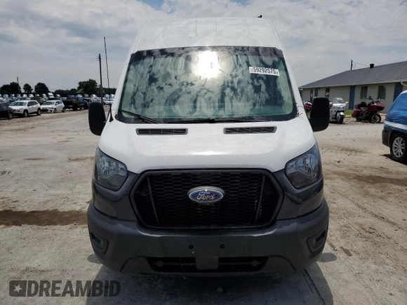 2021 Ford Transit Cargo с VIN 1FTBR1X89MKA53998, выставлен на аукционе Copart как лот 59292575 с пробегом 85 472 миль миль и Списание • Salvage title. История ставок и продаж доступна на DreamBid. Изображение 5.