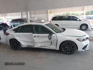 2022 Honda Civic Sport Touring z VIN 19XFL1H8XNE016822, wystawiony jako IAAI lot #42113420 z przebiegiem 30 361 mil mil oraz . Historia ofert i sprzedaży dostępna na DreamBid. Obrazek 13.
