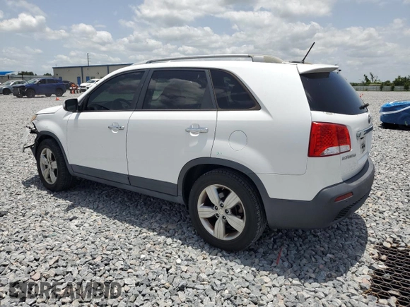 2013 Kia Sorento EX с VIN 5XYKU3A67DG320272, выставлен на аукционе Copart как лот 59878535 с пробегом 118 487 миль миль и Списание • Salvage title. История ставок и продаж доступна на DreamBid. Изображение 2.
