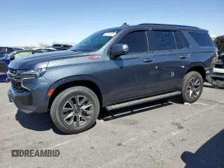 2021 Chevrolet Tahoe Z71 z VIN 1GNSKPKD7MR112430, wystawiony jako Copart lot #61211235 z przebiegiem 61 096 mil mil oraz Szkoda całkowita • Salvage title. Historia ofert i sprzedaży dostępna na DreamBid. Obrazek 1.