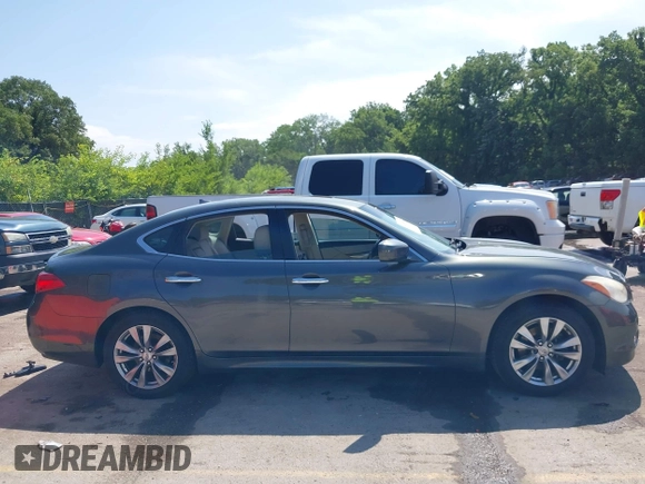 2012 Infiniti M Hybrid with VIN JN1EY1AP4CM910962, listed as a IAAI auction lot 42597542 with 187,171 mi miles and . Bid and sale history available at DreamBid. Image 12.