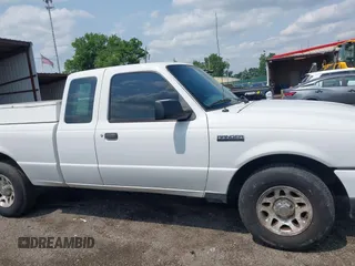 2011 Ford Ranger XLT z VIN 1FTLR4FE8BPA33013, wystawiony jako IAAI lot #42467554 z przebiegiem 325 616 mil mil oraz . Historia ofert i sprzedaży dostępna na DreamBid. Obrazek 13.
